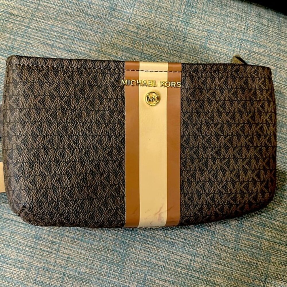 NWOT Michael Kors L/XL fanny pack. Brown monogram leather.